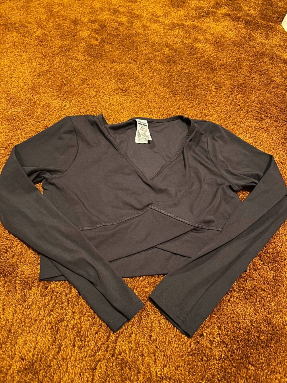 GYMSHARK black longsleeve crossed top
